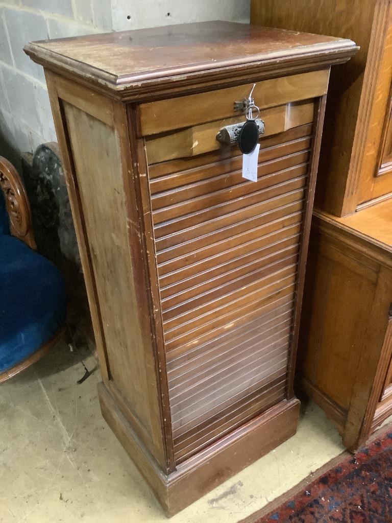 An Edwardian mahogany filing cabinet, with tambour shutter